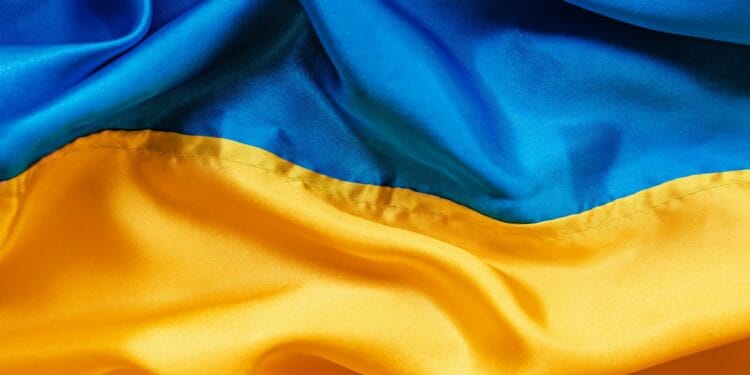 a close up of a blue and yellow fabric