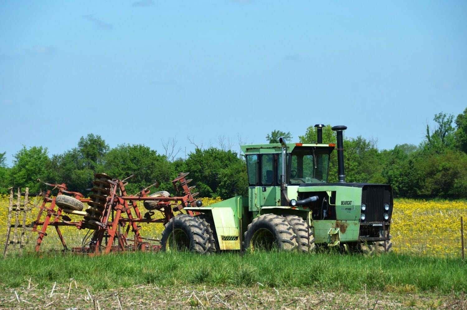 a tractor is parked in the middle of a field